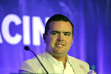 Brian Skirka speaking at the 2024 Global Symposium on Racing