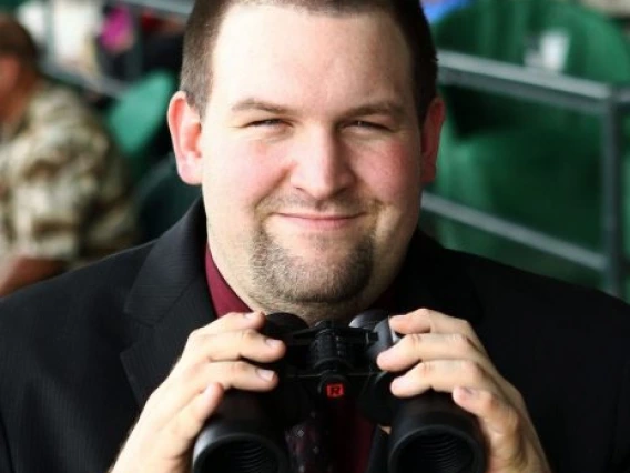 Pete Aiello with binoculars