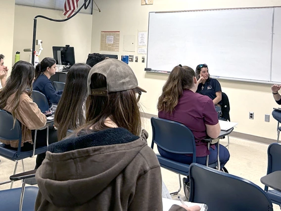 Classroom with Mike Weiss and Hailey Shiffer leading discussion