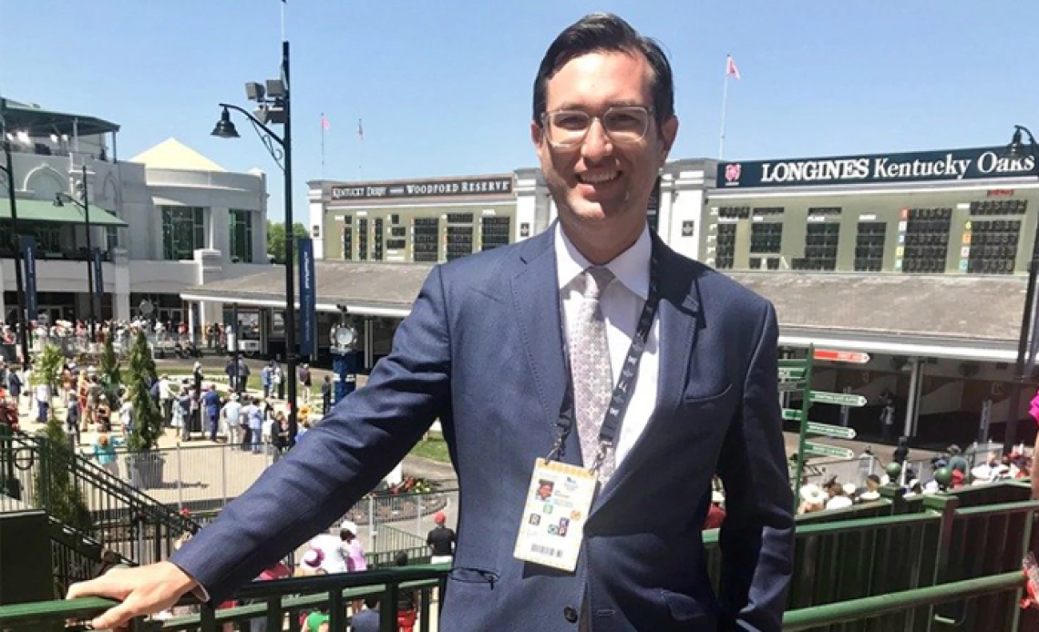 Jim Mulvihill standing by the Churchill Downs paddock