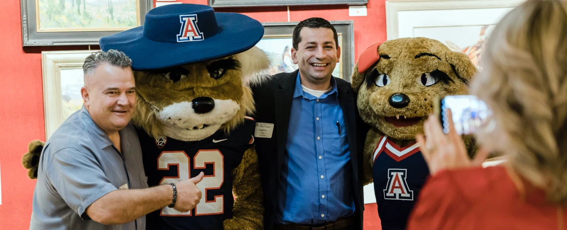 Alumni with Wilbur and Wilma mascots