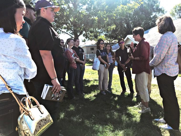 Kathy Berkey teaches students at the Keeneland Sale