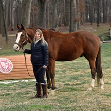 Jessica Hammond standing with PF